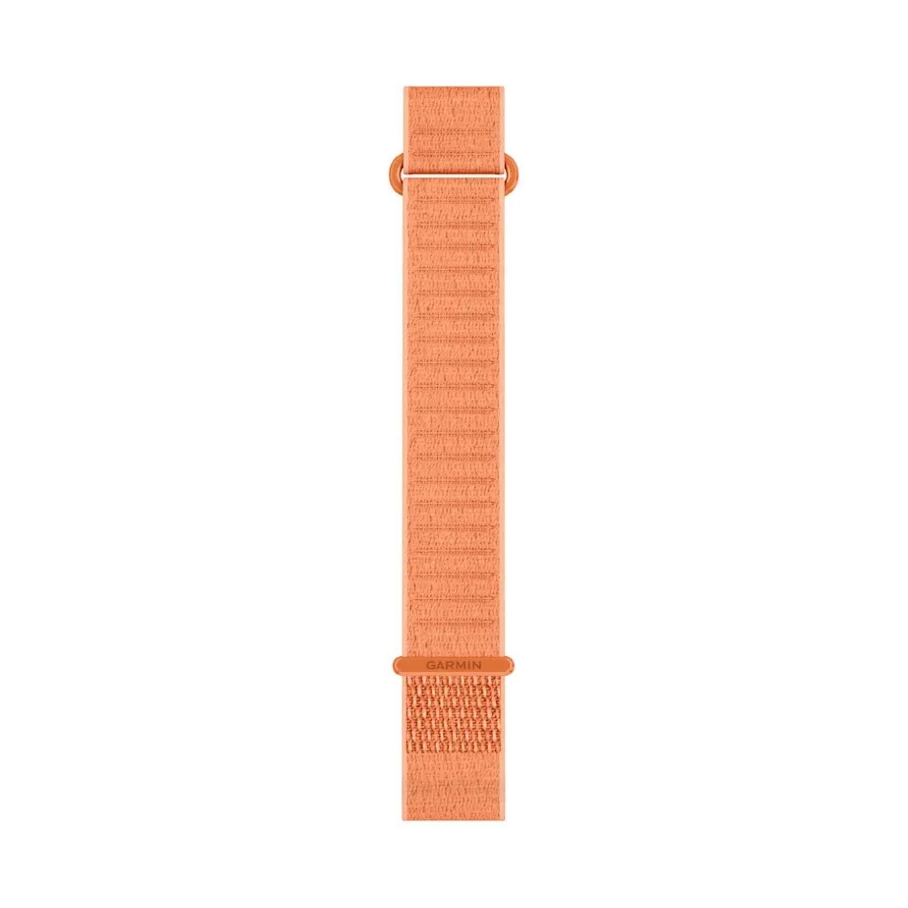 Persikanpinkki pitkä Garmin kangasranneke, jossa on säätölenkit ja Garmin merkintä