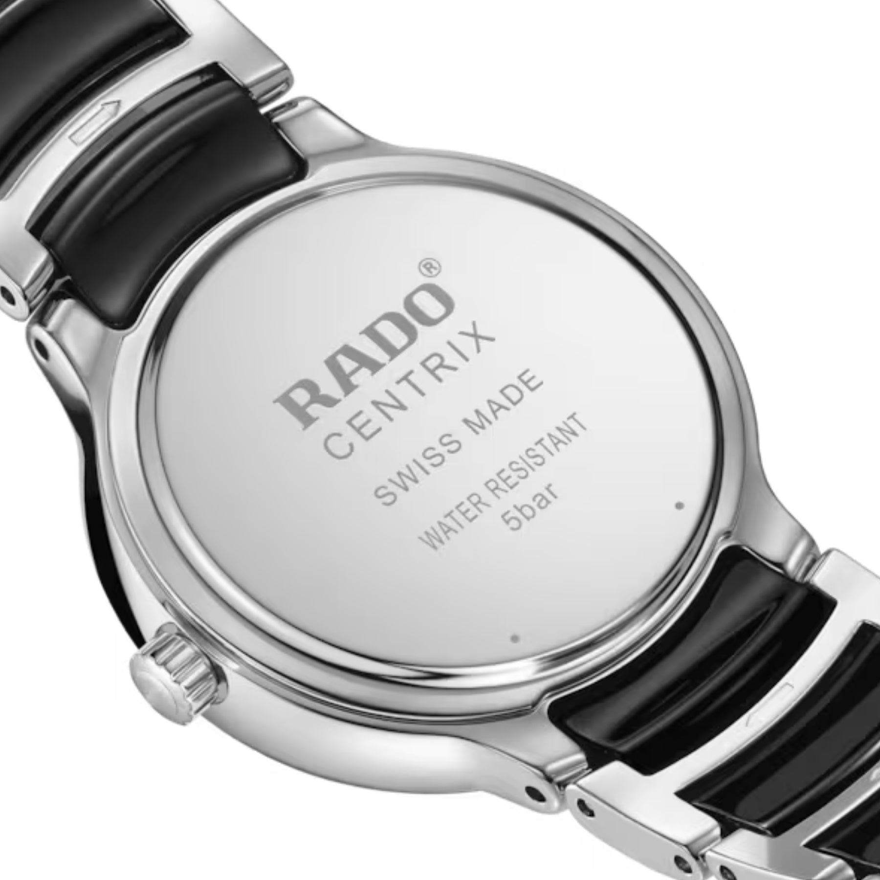 Rado Centrix rannekellon teräksinen takakansi, musta ja teräksen sävyinen ranneke sekä vesitiiviysmerkintä