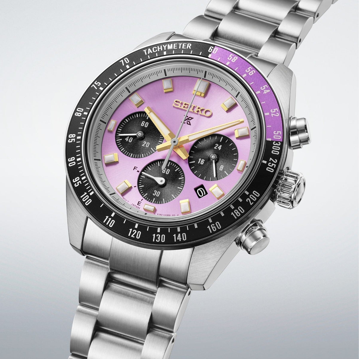 Seiko Prospex Speedtimer miesten rannekello edestä, vaaleanpunainen kellotaulu, kolme ajanottolaskuria ja teräsranneke
