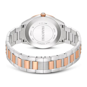 Swarovski rannekellon takapuoli ja kaksivärinen metalliranneke ruusukultaisilla yksityiskohdilla ja teräksisellä takakannella