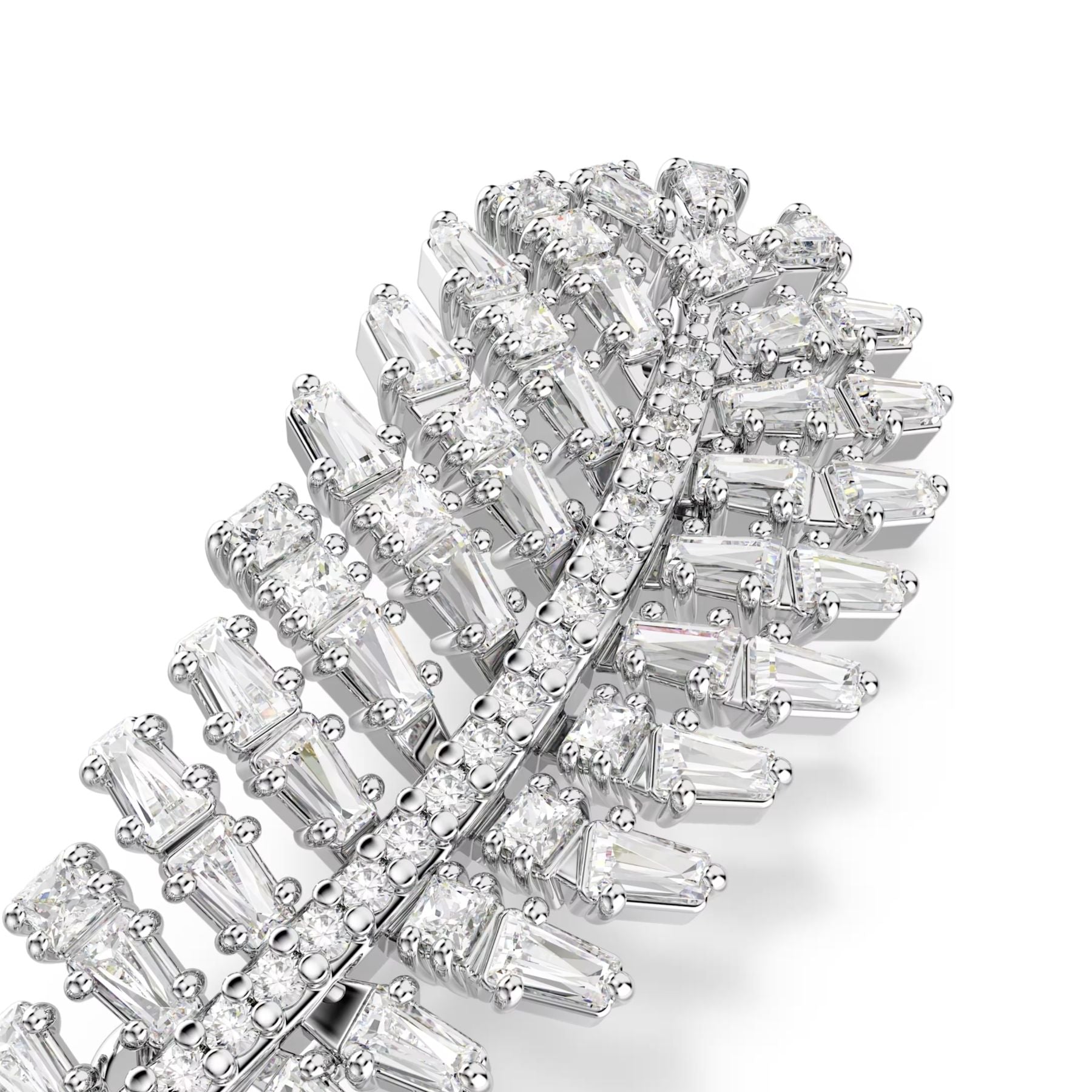 Swarovski sulanmuotoinen rintakoru vaaleaksi rodinoitua metallia ja säihkyviä kirkkaita zirkoneita detaljikuvassa