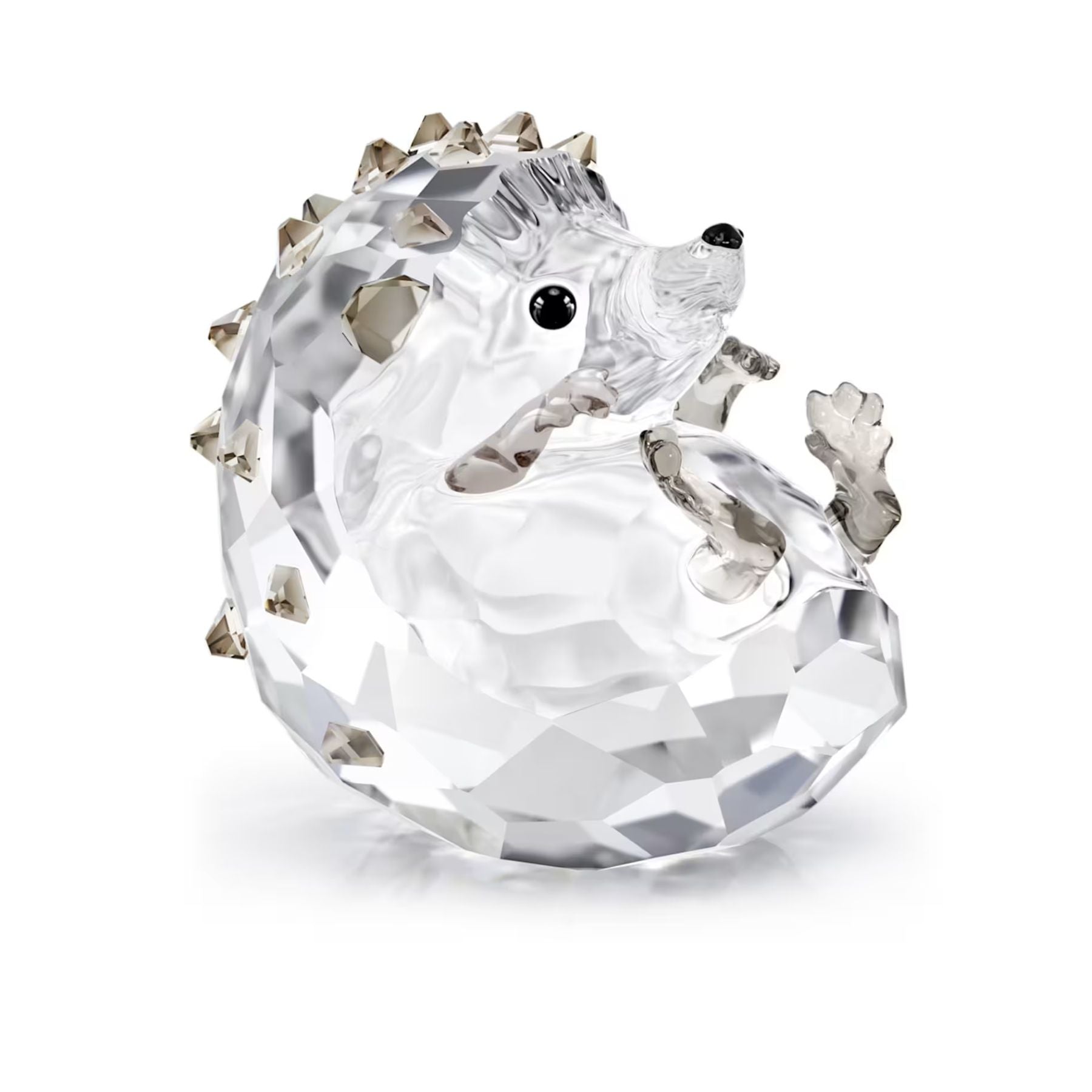 Swarovski kristallifiguuri, leikkisä siili piikit selässä ja metallinhohtoiset yksityiskohdat valkoisella taustalla