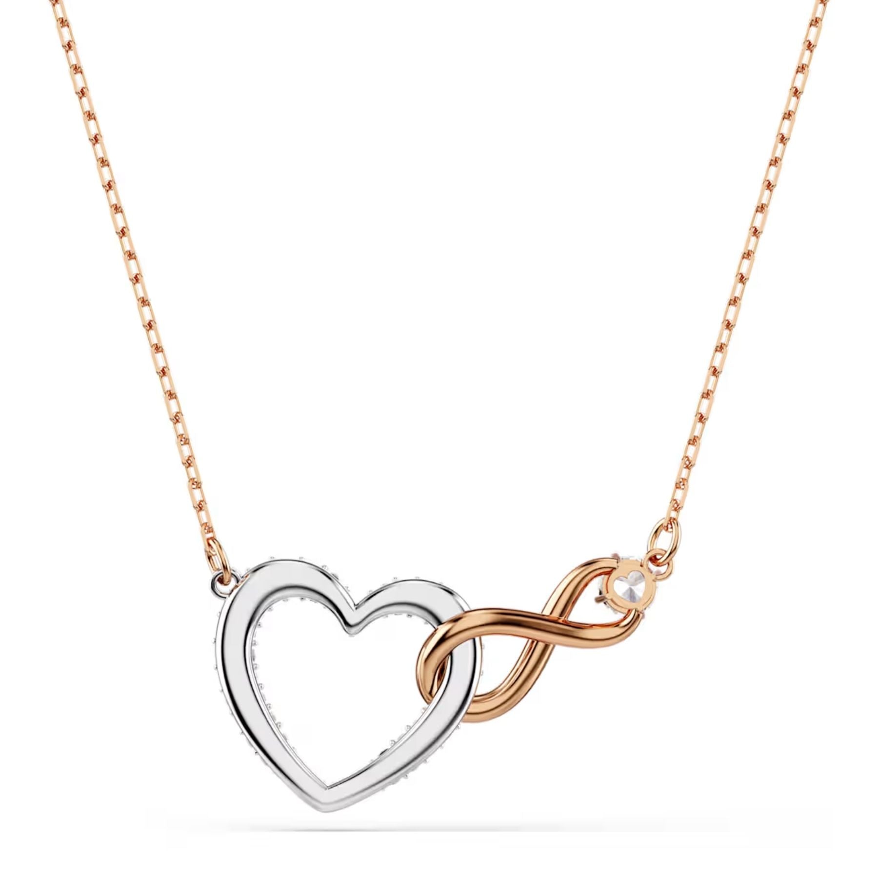 Swarovski kaksivärinen Infinity-riipus hopeanvärisellä sydämellä, vaaleanpunakultaisilla yksityiskohdilla ja kirkkailla kristalleilla ketjussa
