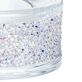 Swarovski kristallinen tuikkukynttilän alusta, jota koristavat säihkyvät hennon violetinsävyiset kristallit tynnyrimäisessä muodossa