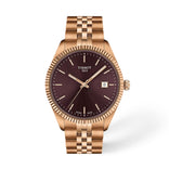 Tissot Ballade naisten rannekello ruusukullanvärisellä teräsrannekkeella, viininpunaisella taululla, uurretulla kehällä ja päivyrillä